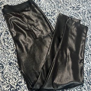 SOLD.  Karl Lagerfield faux leather pants, size Large black print